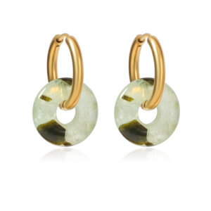 Eleve su estilo con pendientes de donas de jade verde