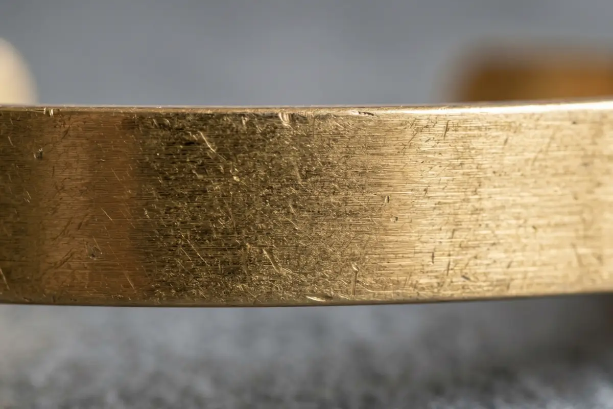Close-up texture of 316L stainless steel used in durable hypoallergenic jewelry manufacturing