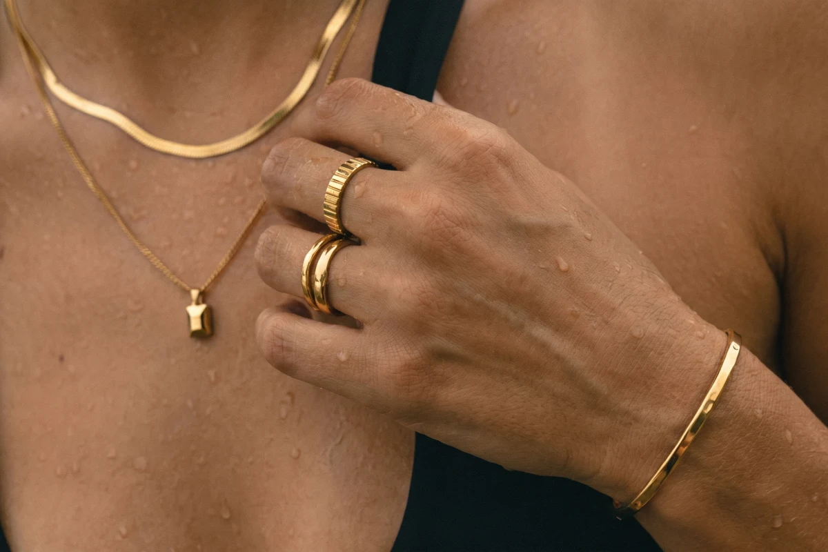 PVD gold stainless steel jewelry with water droplets for daily water resistance